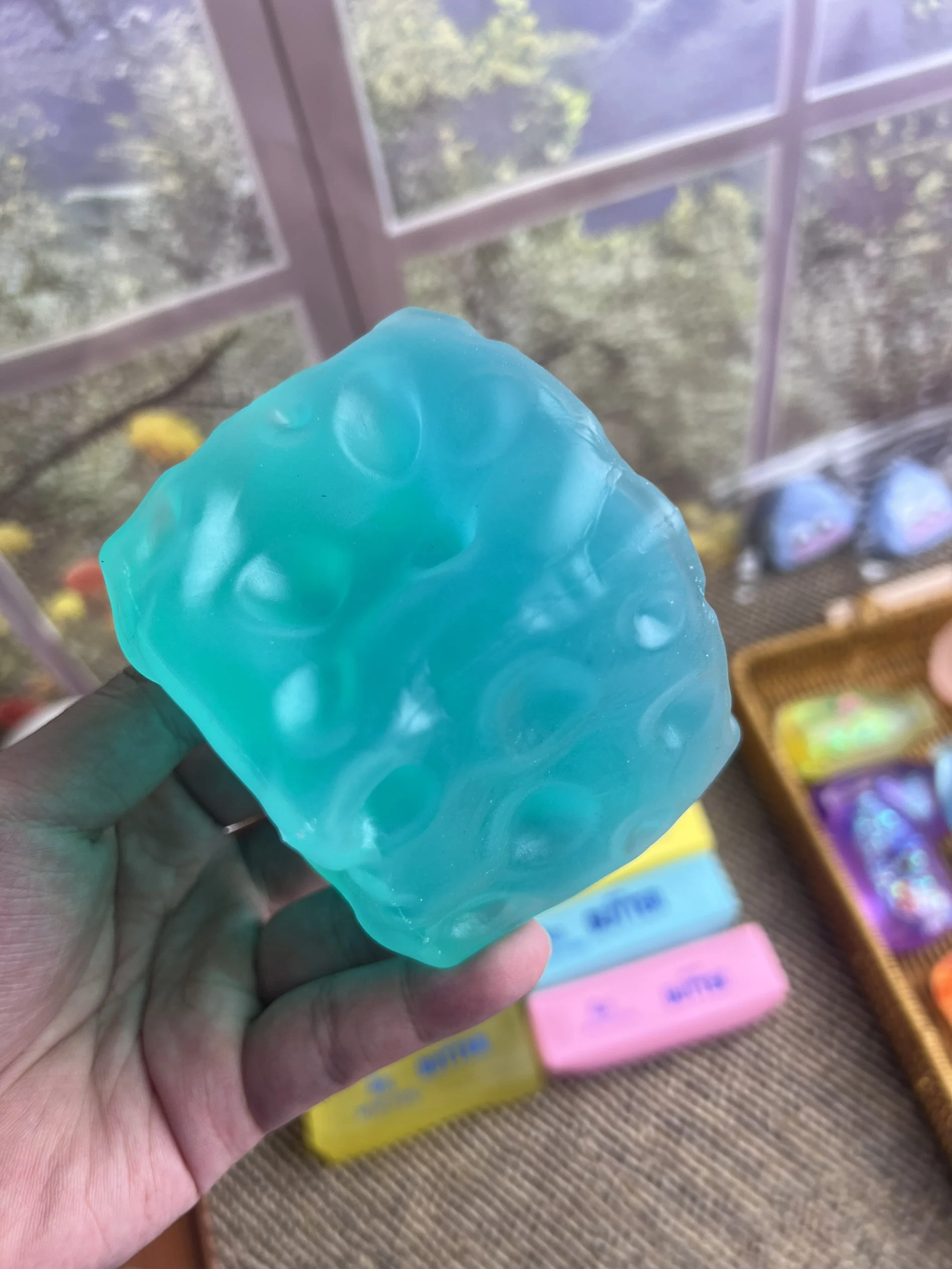 Blue cheese squishy held in hand